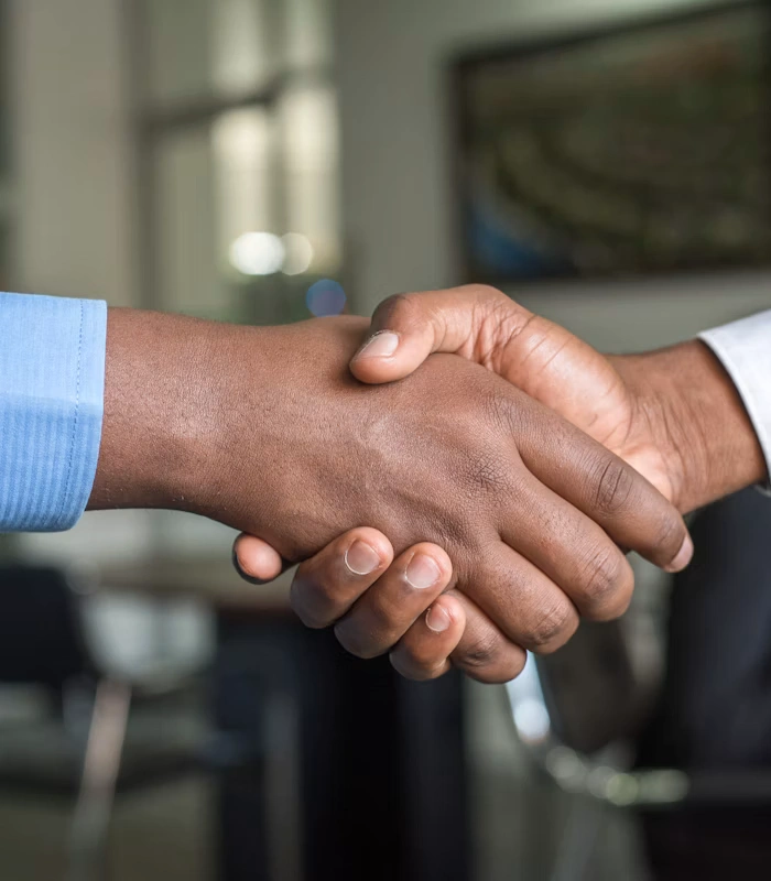 Business partners shaking hands after secure online notarization support